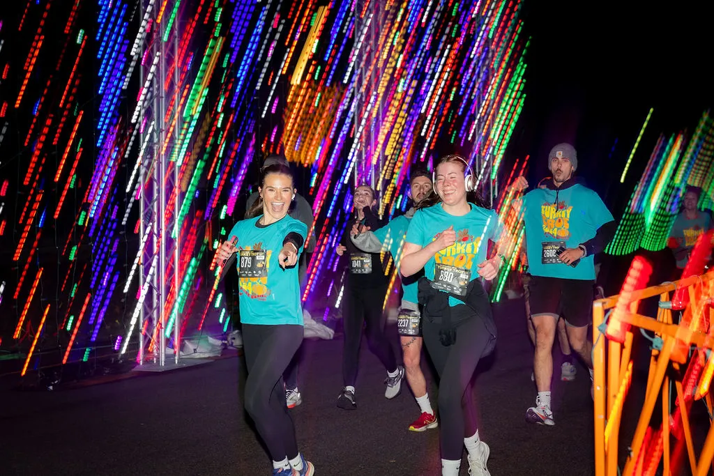 Racers smiling during the Turkey Trot