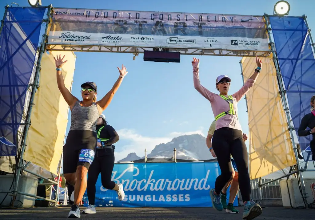Runners reaching the finish line of a race
